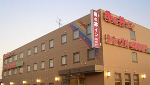 A hotel with multiple floors, a visible entrance, and a signboard with Japanese text. - Hotel AZ Kumamoto Kashima (Kashima)