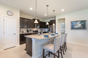 Fridge, microwave, oven, stovetop - Fascinating 5 BR Home Near Disney 8931 (Kissimmee)