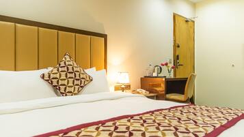 Ropa de cama de alta calidad, minibar y escritorio