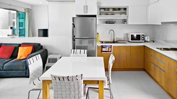 Fridge, microwave, stovetop, coffee/tea maker