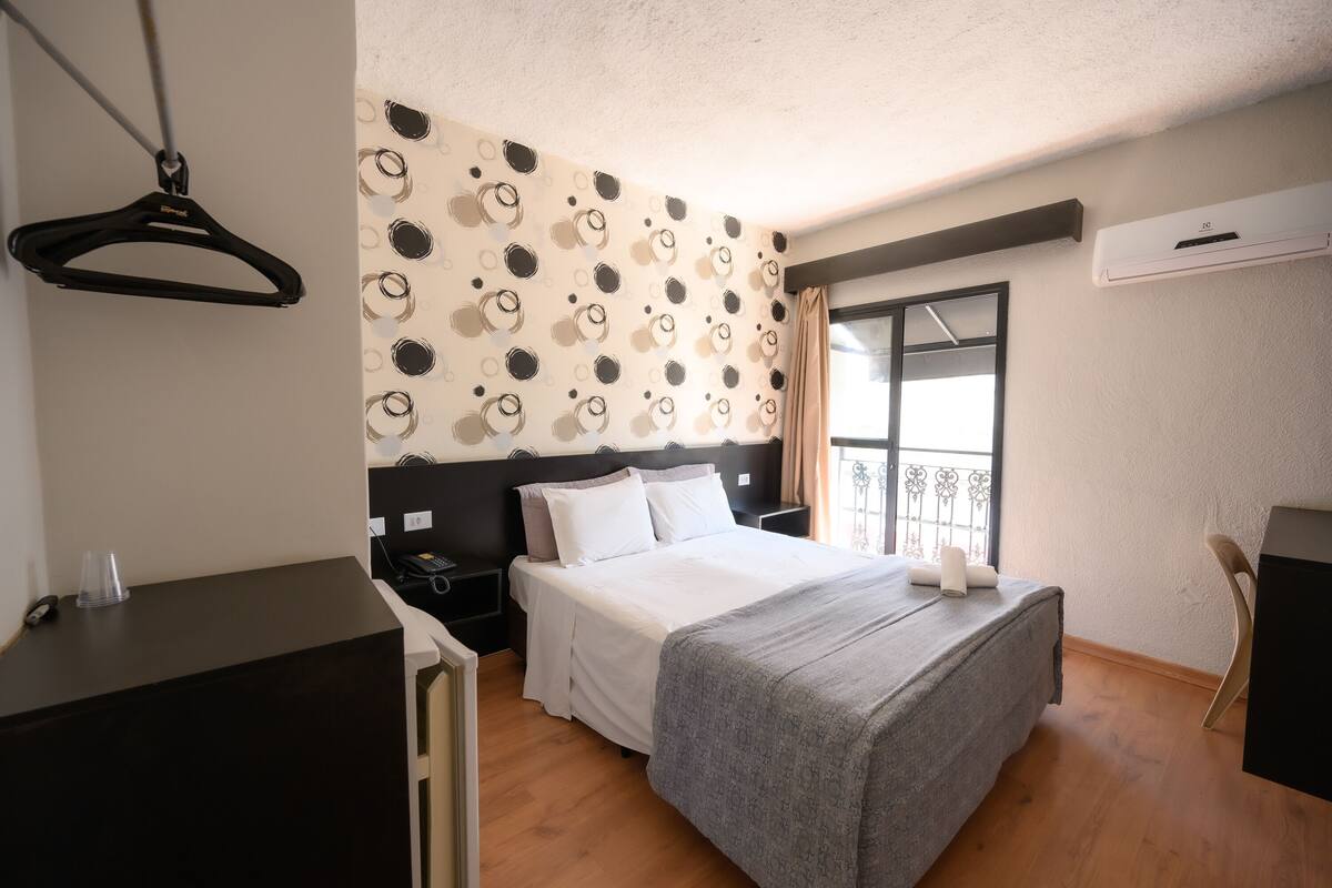 Economy Room, 1 Bedroom | Minibar, WiFi (free), bed sheets