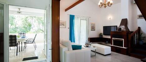 House (Four Bedroom Holiday Home with Pool) | Living room | TV