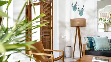 Exclusive Villa, 2 Bedrooms | Living area | 40-inch flat-screen TV with cable channels, TV