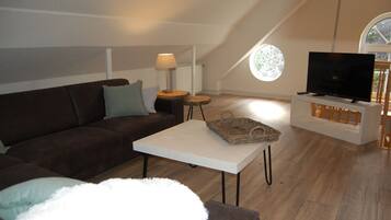 Apartment | Living room | 80-inch flat-screen TV with cable channels, TV