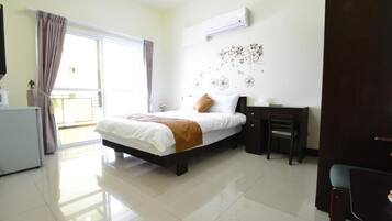 Desk, blackout curtains, free WiFi, bed sheets