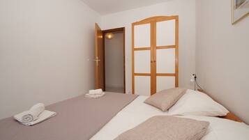 Departamento, 2 habitaciones, vista al mar | 2 habitaciones, wifi gratis y ropa de cama