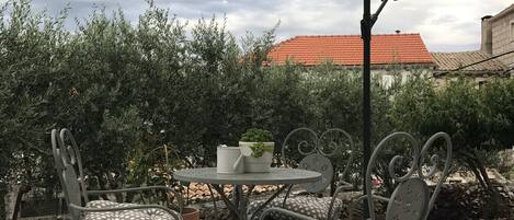 Apartamento superior | Terraço/pátio