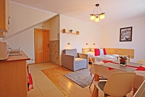 Habitación Deluxe doble | Ropa de cama de alta calidad, decoración individual, cunas gratuitas