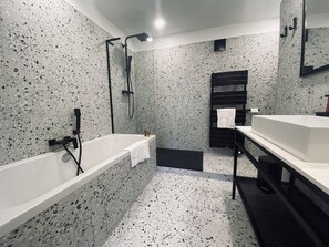 Luxury Suite | Bathroom | Separate tub and shower, rainfall showerhead, designer toiletries