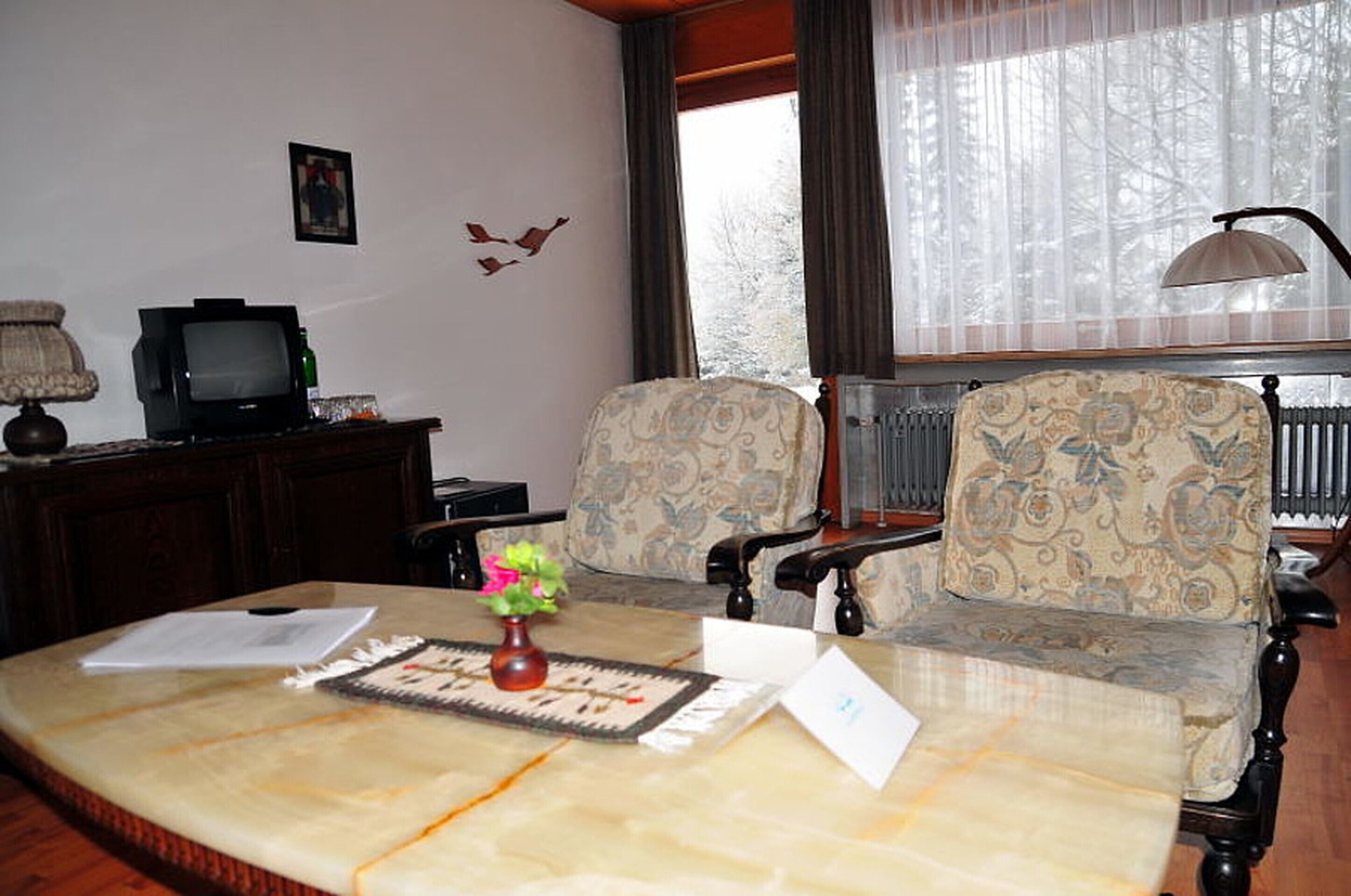 standard apartment, 2 bedrooms | living room | flat-screen tv