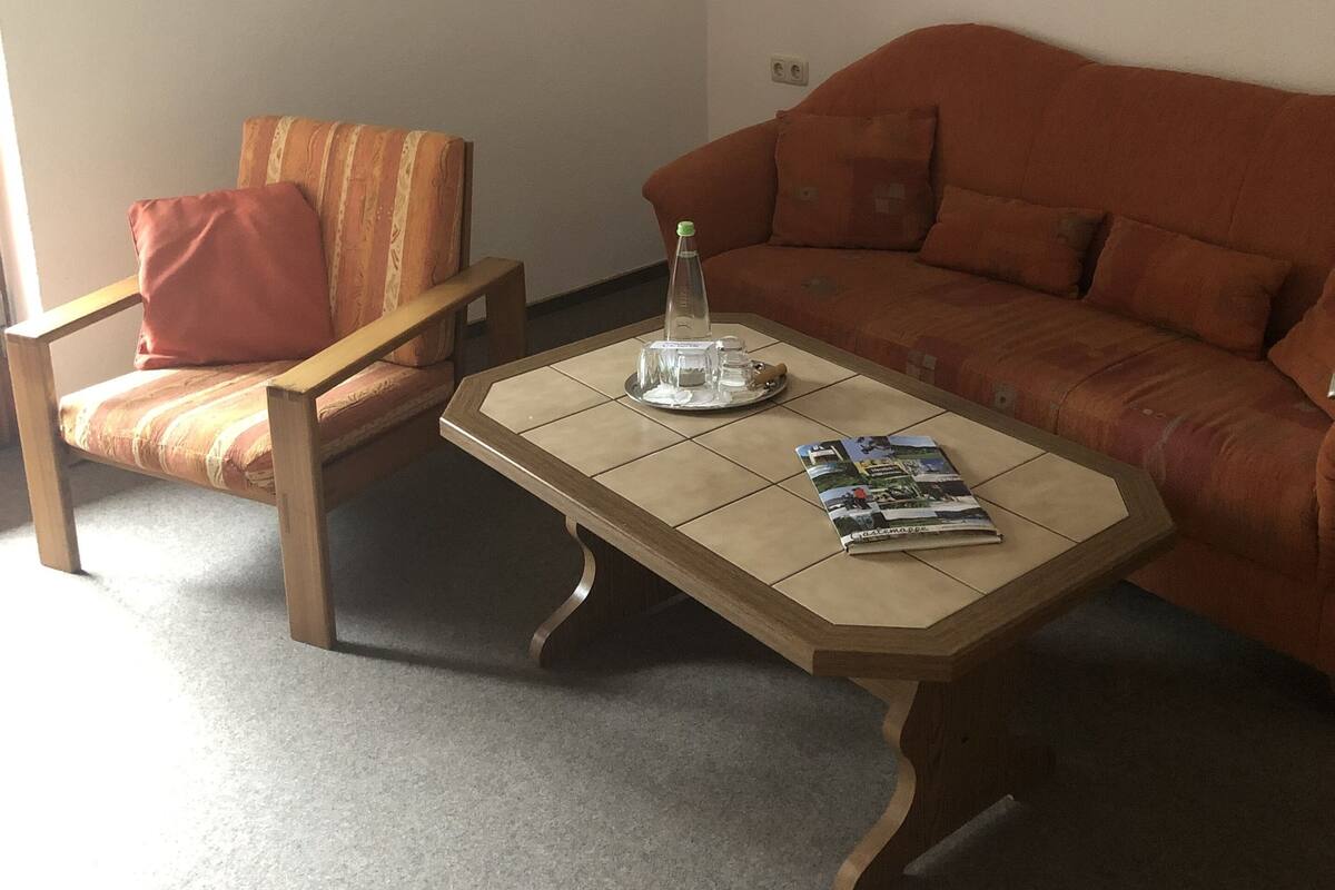 standard apartment, 2 bedrooms | living room | flat-screen tv