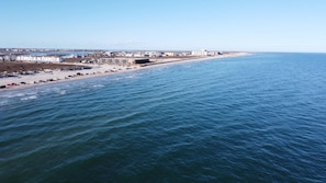 On the beach, sun-loungers, beach towels
