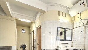 Shower, rainfall showerhead, soap, toilet paper