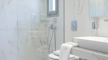 Superior Triple Room | Bathroom | Shower, hair dryer, bathrobes, towels