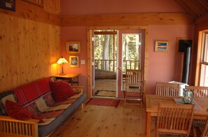 Comfort Cabin | Living area | 32-inch LCD TV with cable channels, TV, fireplace - Brickyard Cottage 48 by Winfield Inn (Bayfield)