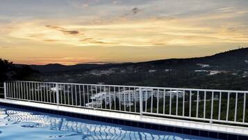 Seasonal outdoor pool, pool umbrellas, sun loungers