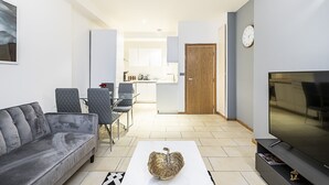 Apartment, 2 Bedrooms, Ground Floor (sleeps 6) | Living area | 32-inch flat-screen TV with satellite channels, TV - Laystall Apartment (London)
