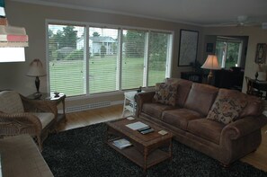 Cabin | Living area | 40-inch LCD TV with cable channels, TV - Pine Cottage by Winfield Inn (Bayfield)