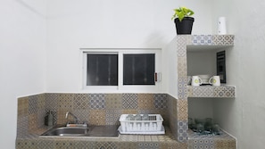 Fridge, electric kettle, toaster, cookware/dishes/utensils