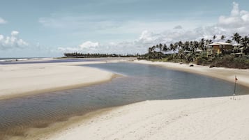 On the beach, sun loungers, beach towels