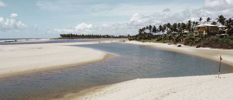 On the beach, sun-loungers, beach towels