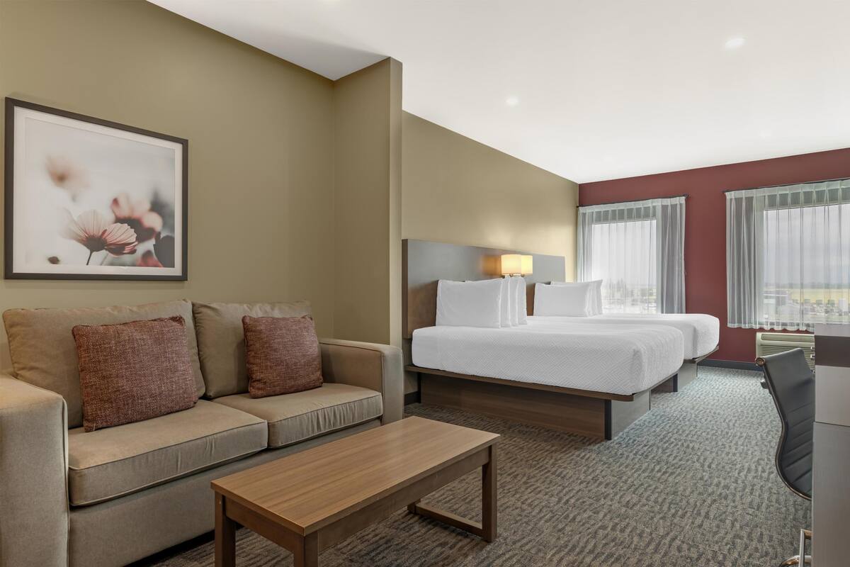 Suite, 2 Queen Beds, Non Smoking, Refrigerator & Microwave (with Sofabed) | Desk, laptop workspace, iron/ironing board, WiFi (free)