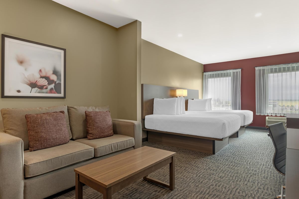 Suite, 2 Queen Beds, Non Smoking, Refrigerator & Microwave (with Sofabed) | Desk, laptop workspace, iron/ironing board, WiFi (free)