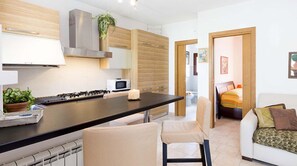 Appartement, 1 slaapkamer | Woonruimte | Een flatscreentelevisie