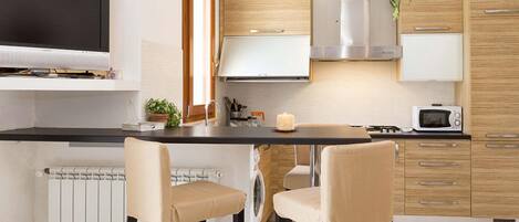 Apartment, 1 Bedroom | Private kitchen | Full-sized fridge, microwave, oven, stovetop