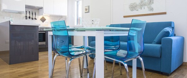 Appartamento, 1 camera da letto | Area soggiorno | TV