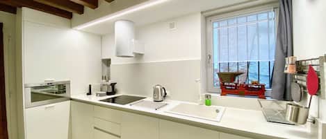 Luxury Apartment, 2 Bedrooms | Private kitchen | Full-size fridge, microwave, oven, stovetop