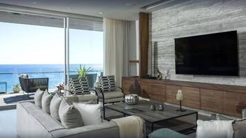 Vila (1 Bedroom) | Área de estar | TV de tela plana 32 polegadas com canais via satélite, TV