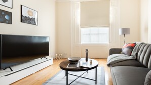 Appartement, rez-de-chaussée (A) | Coin séjour