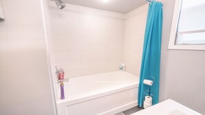 Family Room | Bathroom - Lux Host Ltd. (Winnipeg)