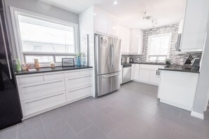 Chambre Familiale | Cuisine partagée