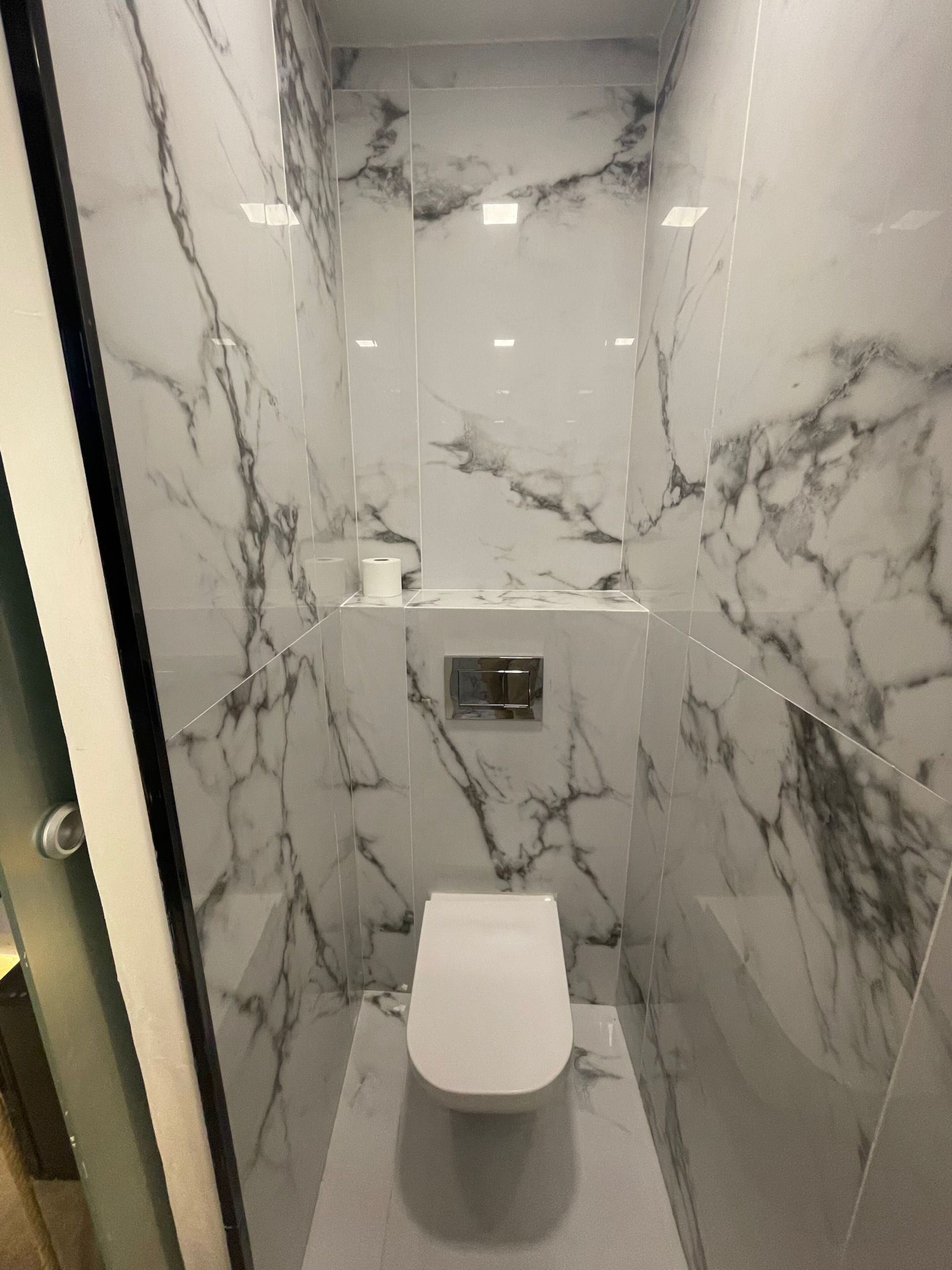 shower, rainfall showerhead, hair dryer, towels