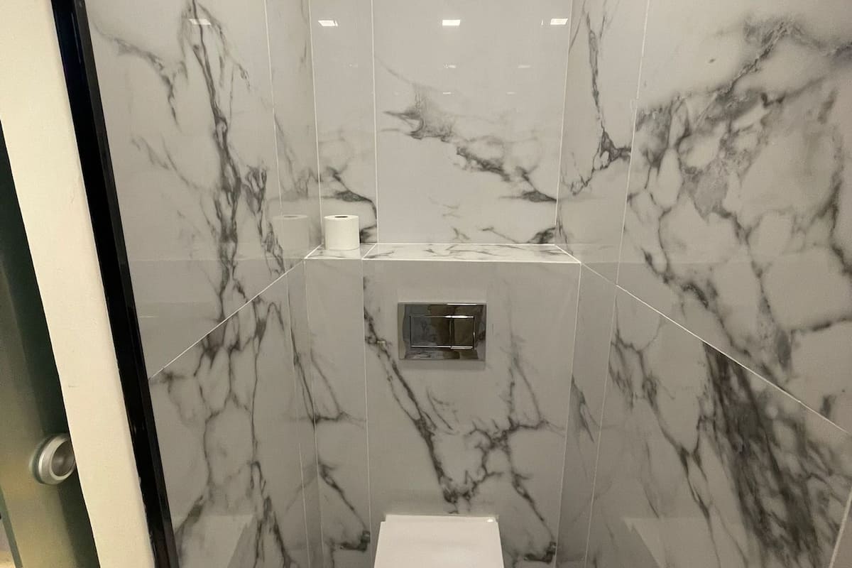 shower, rainfall showerhead, hair dryer, towels