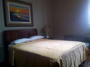 Quarto casal, 1 cama de casal | Frigobar, Wi-Fi de cortesia