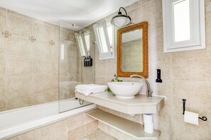 Shower, rainfall showerhead, towels, soap