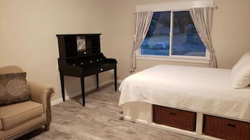 2 habitaciones, tabla de planchar con plancha y ropa de cama