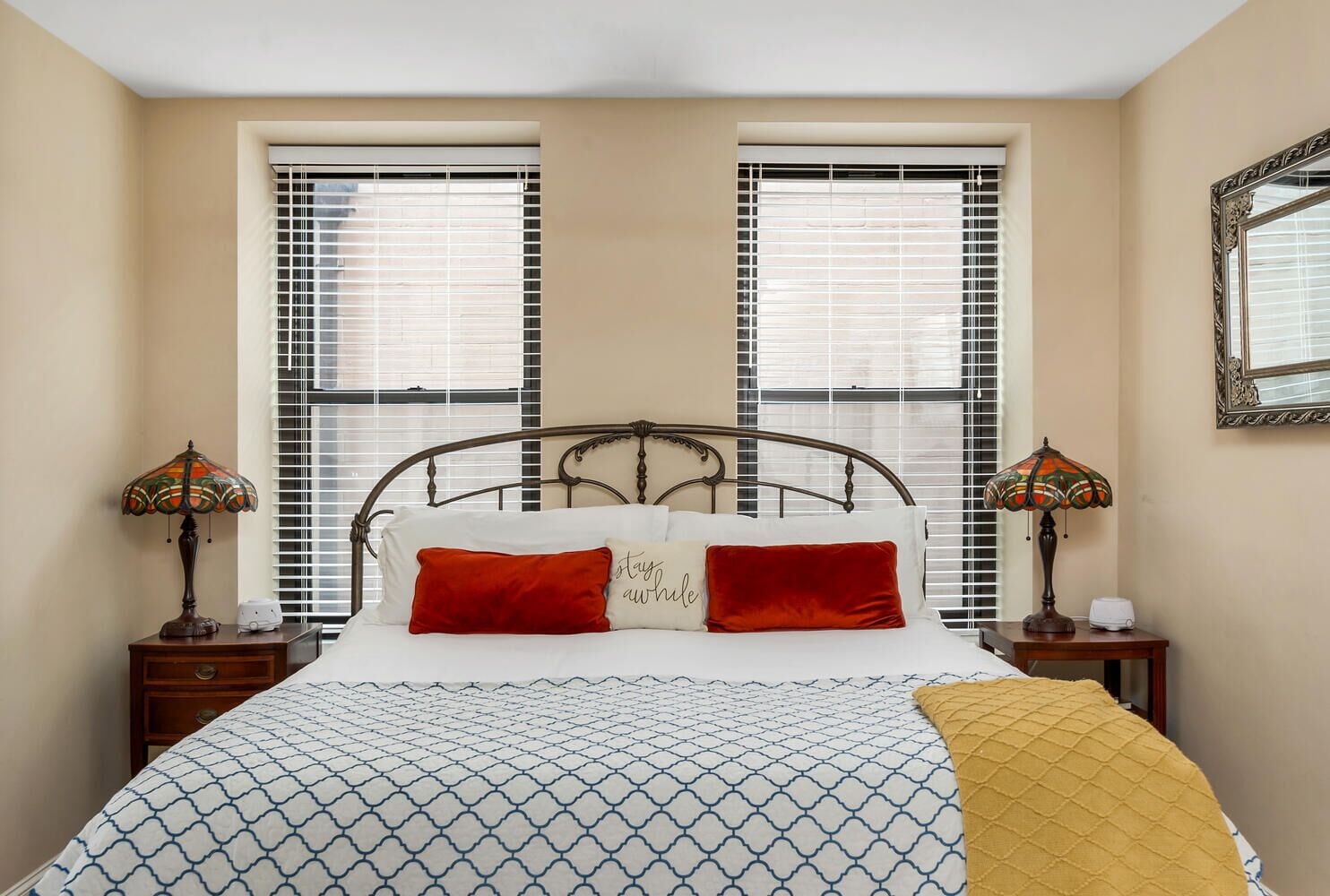 King bed with a lamp on each side.  Be warned you may fall asleep on here.