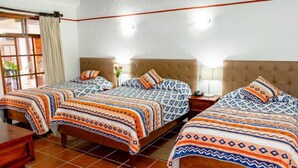 Quadruple Room | Iron/ironing board (on request), free WiFi, bed sheets - Hotel Posada el Castellano (Comitan de Dominguez)