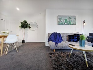 Deluxe Apartment, 1 Bedroom | Living area | Flat-screen TV - One Bedroom Unit with Panoramic Views (Queenstown)