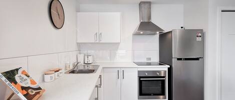 Deluxe-Apartment, 1 Schlafzimmer | Eigene Küche | Großer Kühlschrank, Mikrowelle, Ofen, Herdplatte