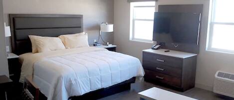 Klassieke studio suite, 1 kingsize bed met slaapbank | Donsdekens, pillowtop-bedden, individueel gemeubileerd