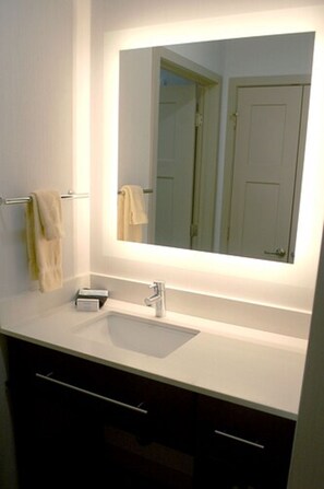 Shower, rainfall showerhead, hair dryer, towels