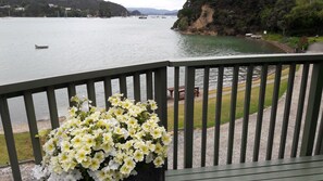 Family House, 4 Bedrooms (The Beach Bach) | Water view - Water's Edge Holiday Homes (Opua)
