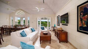 Villa, 4 Bedrooms | Living area | 36-inch TV with cable channels