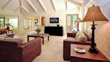 Villa, 4 Bedrooms | Living area | 36-inch TV with cable channels