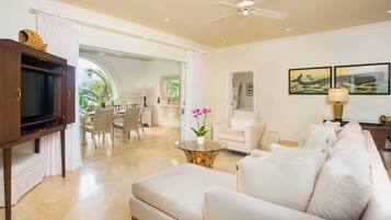 Apartment, 3 Bedrooms | Living area | 36-inch TV with cable channels, DVD player